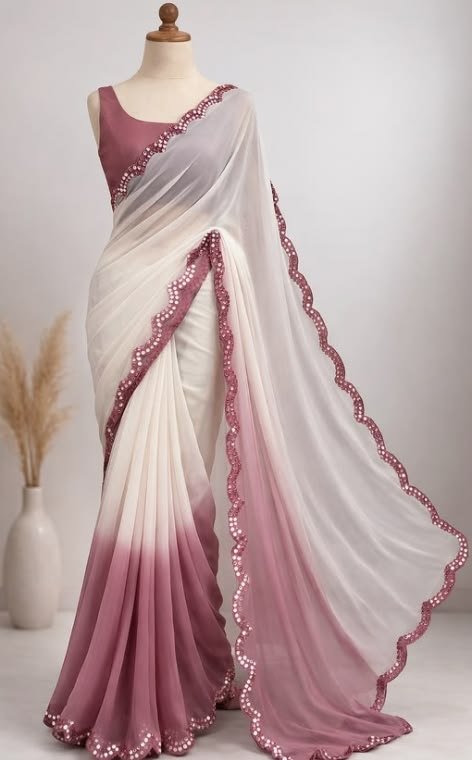 A pretty Saree in Pink and White Colour
